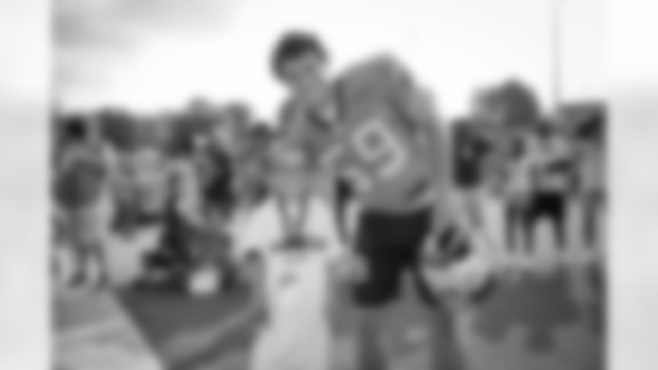 Training camp helmet walk