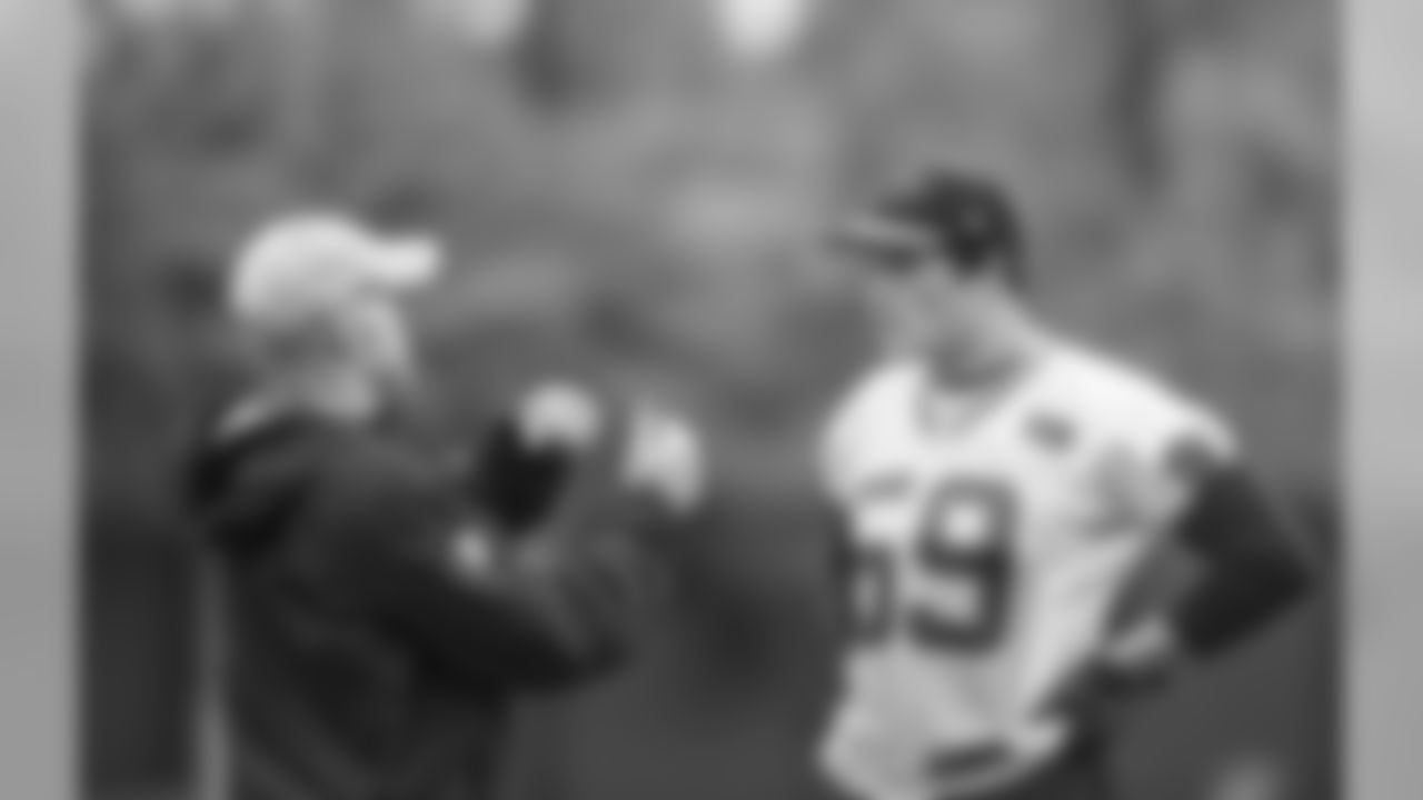 Defensive Coordinator Sean McDermott and LB Luke Kuechly