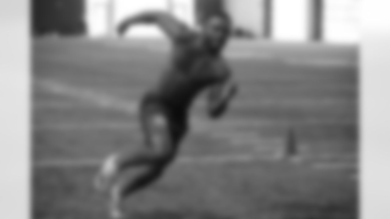 Running back Ricky Person runs a position drill for NFL scouts during North Carolina State Pro Day, Tuesday, March 29, 2022, in Raleigh, N.C. (AP Photo/Chris Seward)