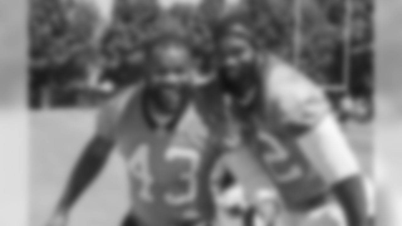 RB Fozzy Whittaker and TE Marcus Lucas