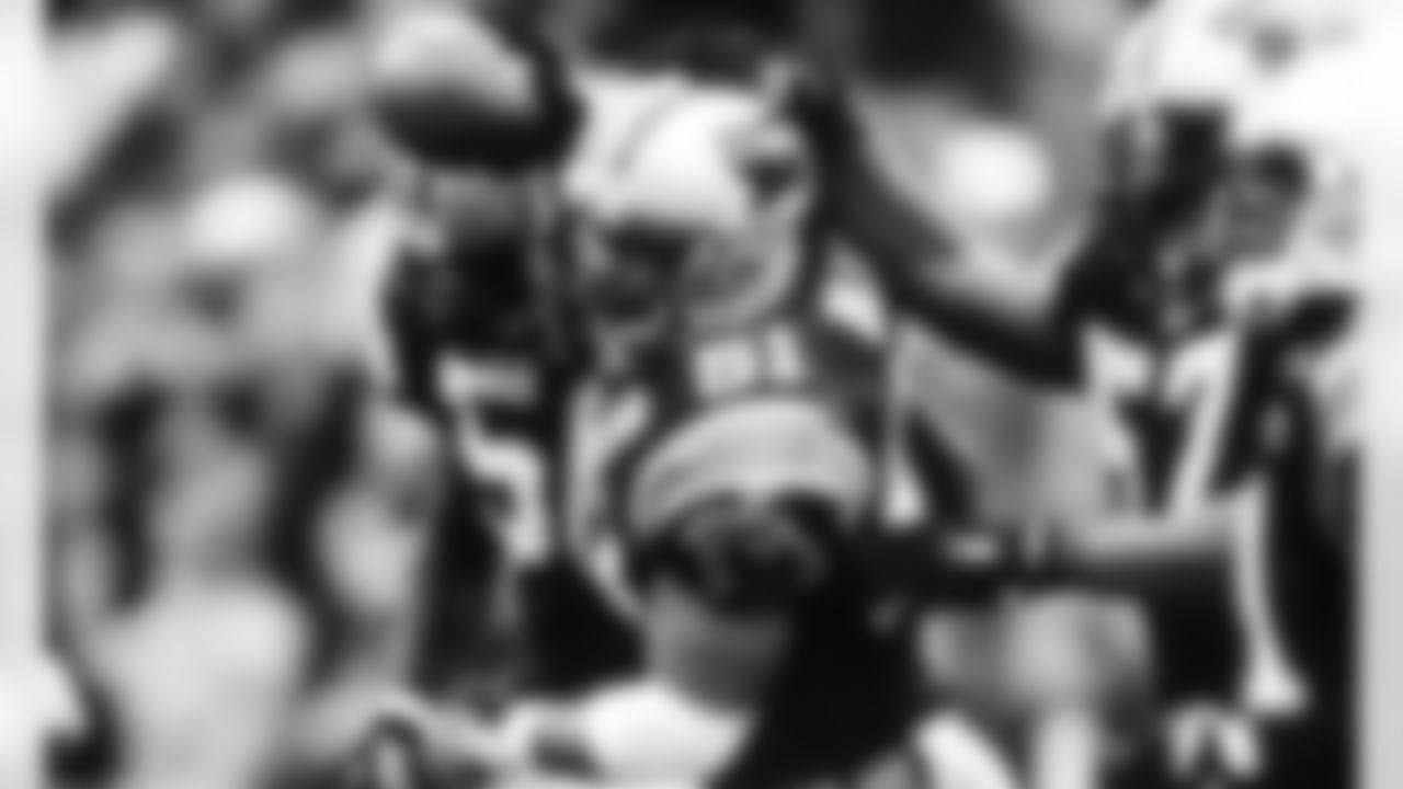 Sam Mills played for Carolina from 1995-97, then served as an assistant coach from 1998-2004.