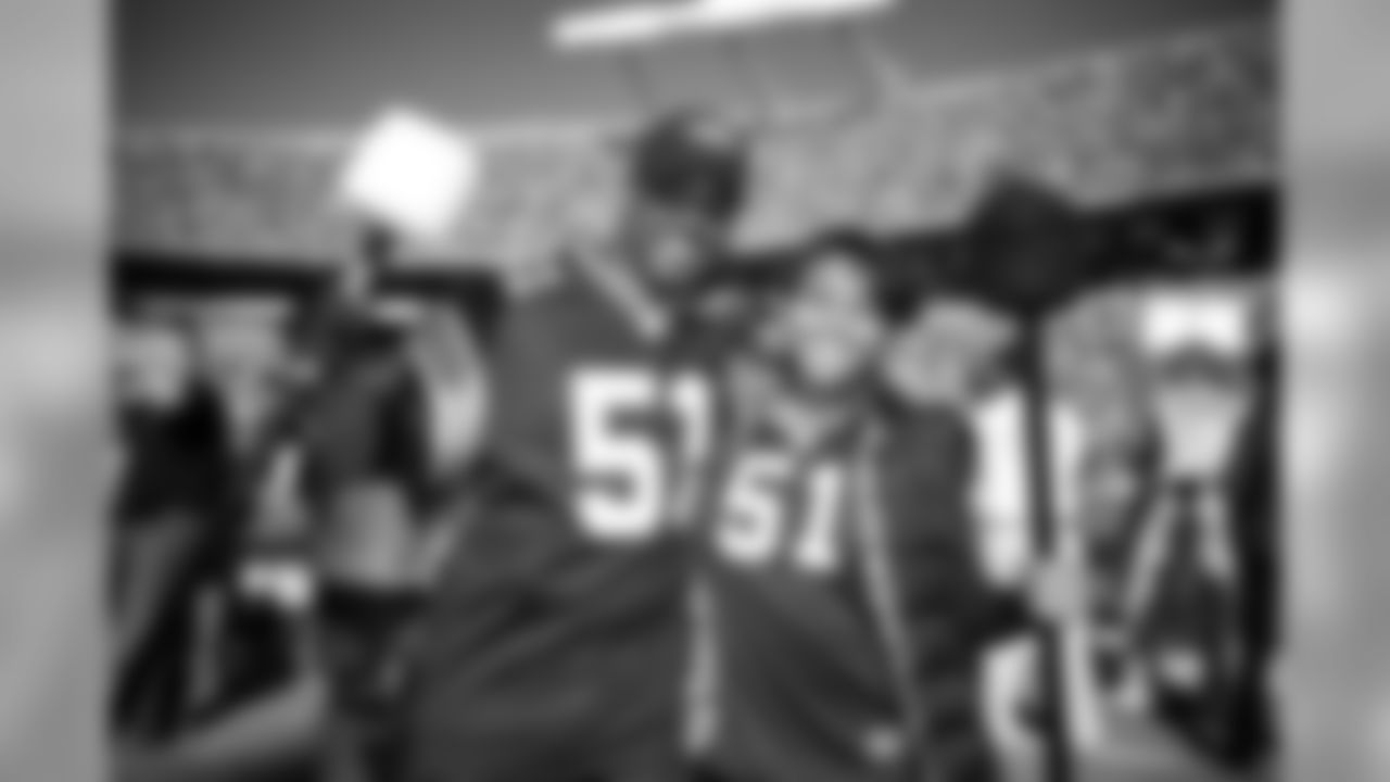 Children of former Panthers linebacker and coach Sam Mills