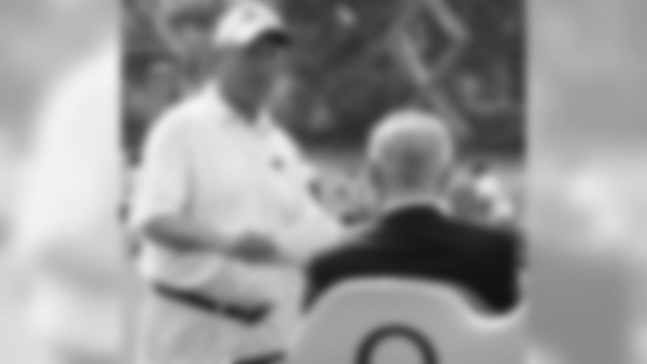 Richardson chatted with head coach John Fox as the Panthers stretched out.