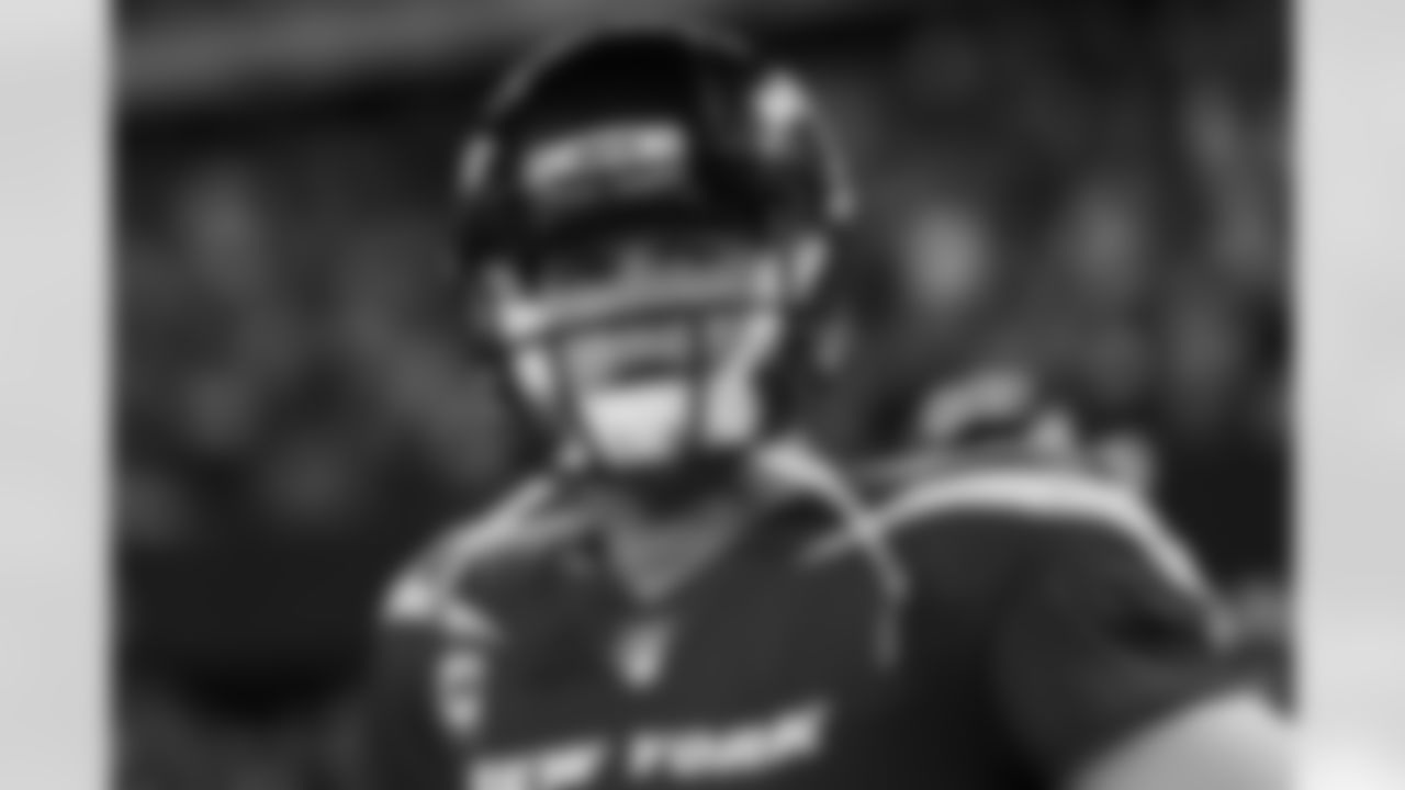 New York Jets quarterback Sam Darnold (14) looks on from the sidelines prior to an NFL football game against the New England Patriots, Monday, Oct. 21, 2019, in East Rutherford, N.J. The Patriots defeated the Jets, 33-0. (Ryan Kang via AP)