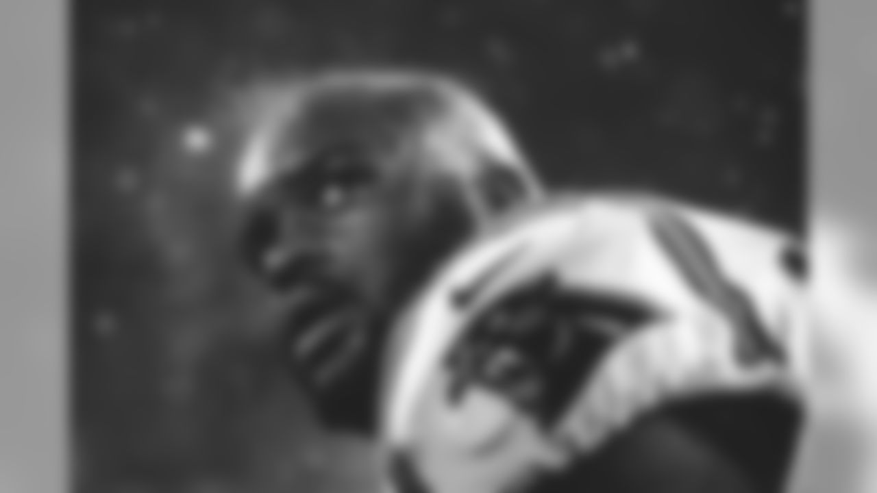 I have always wanted to make a photo of steam rising off of the hot head of a football player in frigid temps. The visually iconic snow game at Lambeau Field provided that opportunity. Offensive tackle Taylor Moton was seated on the bench after coming off the field, and as he removed his helmet you could see the steam pouring off his shaved head. The stadium lights shone just enough to give his head a halo, outlining it against the dark and snowy background. It is a photo that I have always wanted to make and probably my most favorite of this entire season.