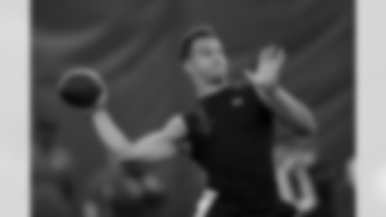 Quarterback Desmond Ridder throws a pass in a football drill during Cincinnati Pro Day in Cincinnati, Thursday, March 24, 2022. (AP Photo/Aaron Doster)
