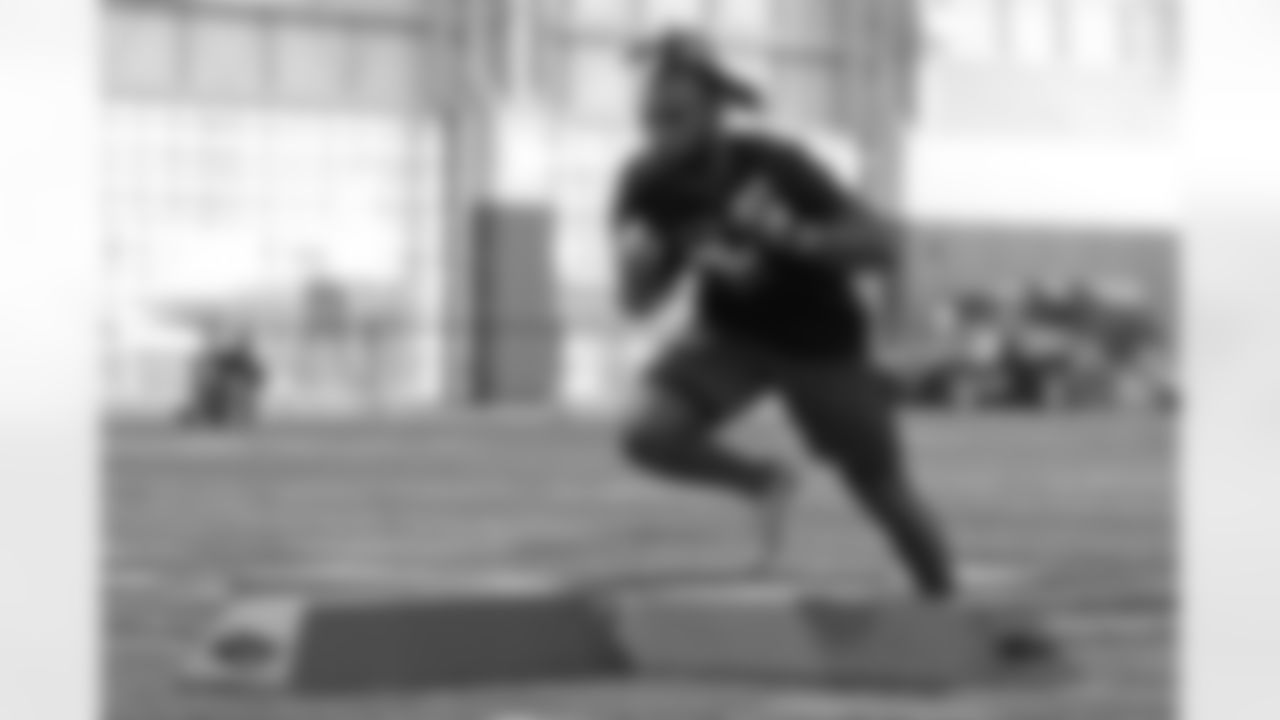 Running back Bam Knight runs a drill for NFL scouts during North Carolina State Pro Day, Tuesday, March 29, 2022, in Raleigh, N.C. (AP Photo/Chris Seward)
