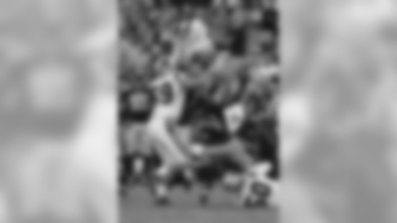 Kuechly picks off a tipped pass for his first career interception against Seattle.