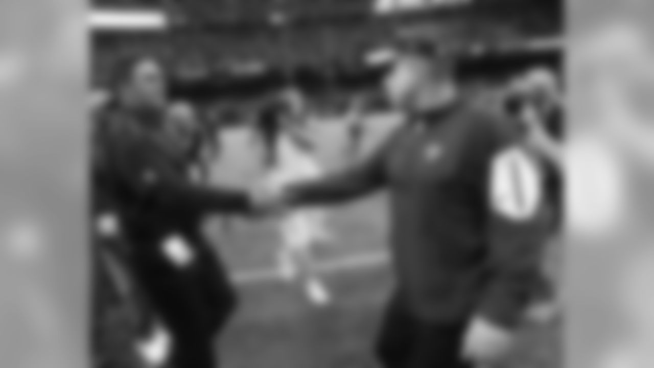 New Orleans Saints head coach Sean Payton, right, shakes hands with Carolina Panthers head coach Ron Rivera after an NFL football game in New Orleans, Sunday, Dec. 6, 2015. The Panthers won 41-38. (AP Photo/Bill Feig)