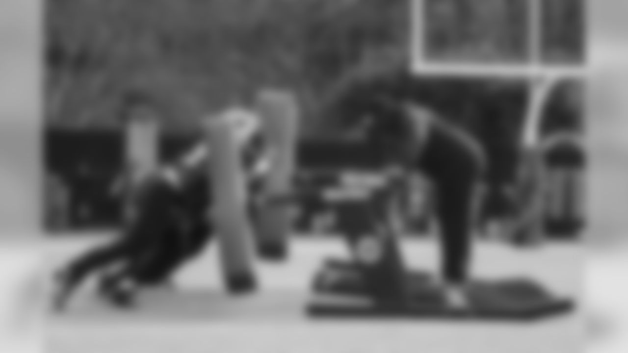 Asst. Offensive Line Coach Ray Brown and Offensive Linemen