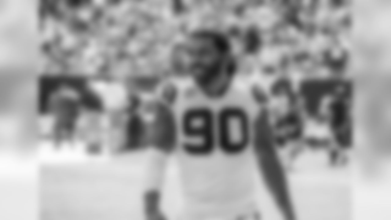 Julius Peppers walks off the field during the game against the Giants on Sun., Oct. 7, 2018.