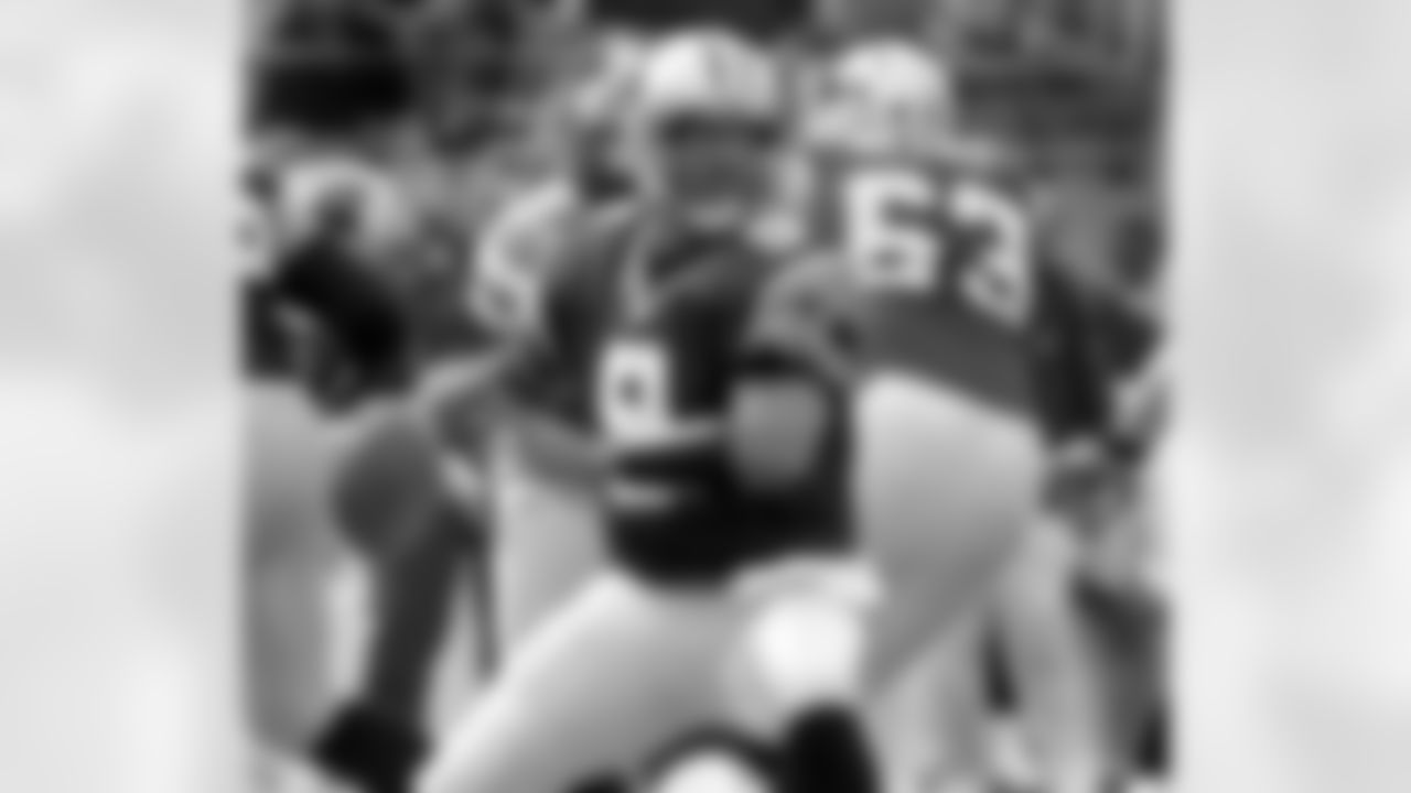 Carolina Panthers quarterback Rodney Peete (9) prepares to throw a pass in the second quarter of the Panthers' 52-31 win over the Cincinnati Bengals at Ericsson Stadium, in Charlotte, N.C., Sunday Dec. 8, 2002. Peete went 21-for-29 for a season high 319 yards, four yards short of his career high, and three touchdowns. (AP Photo/Mike McCarn)