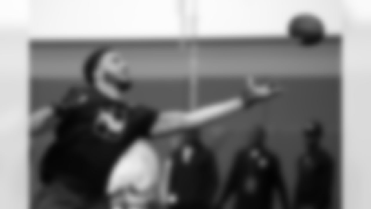 Tight end Dylan Parham reaches for a pass during North Carolina State Pro Day, Tuesday, March 29, 2022, in Raleigh, N.C. (AP Photo/Chris Seward)
