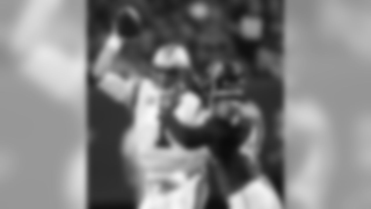 Atlanta Falcons defensive end Vic Beasley (44) pressures Carolina Panthers quarterback Cam Newton (1) during the first half of an NFL football game, Sunday, Dec. 27, 2015, in Atlanta. (AP Photo/John Bazemore)