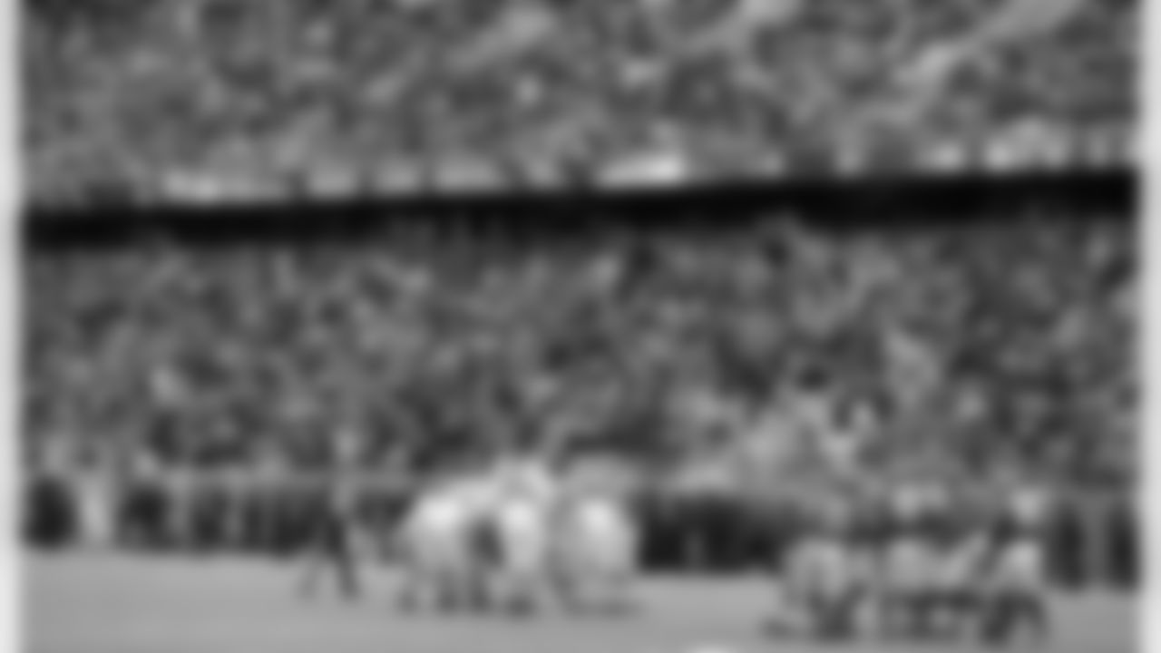 Players huddle on the field during the first half of an NFL football game between the Minnesota Vikings and the Carolina Panthers, Sunday, Nov. 30, 2014, in Minneapolis. (AP Photo/Ann Heisenfelt)