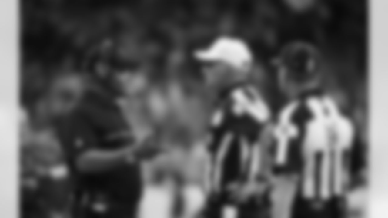 Detroit Lions head coach Jim Caldwell talks with referee Bill Vinovich during the first half of an NFL football game against the Jacksonville Jaguars, Sunday, Nov. 20, 2016 in Detroit. (AP Photo/Paul Sancya)