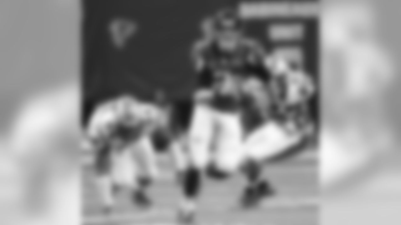 Atlanta Falcons quarterback Matt Ryan (2) runs out of the pocket against the Carolina Panthers during the second half of an NFL football game, Sunday, Dec. 27, 2015, in Atlanta. (AP Photo/John Bazemore)