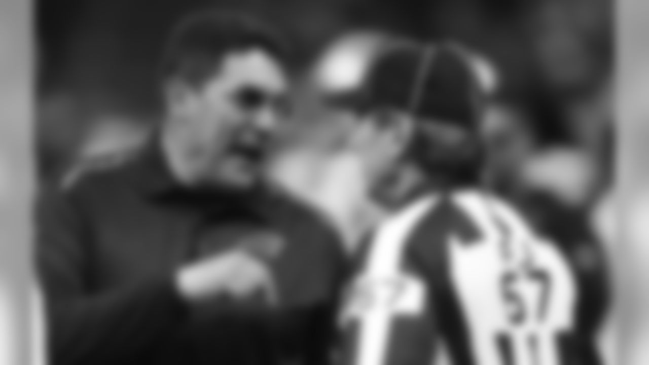 Carolina Panthers head coach Ron Rivera challenges an official in the second half of an NFL football game against the New Orleans Saints in New Orleans, Sunday, Dec. 6, 2015. (AP Photo/Bill Feig)