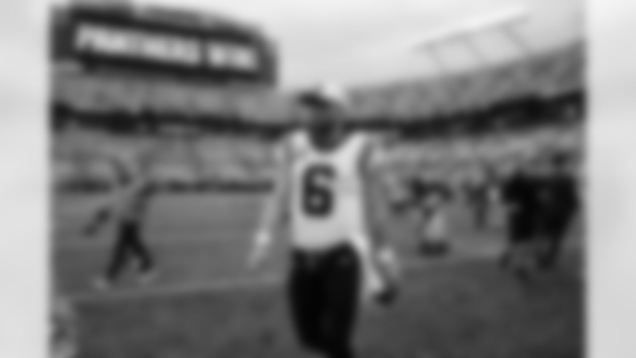 Carolina Panthers quarterback Baker Mayfield (6) walks off the field after an NFL football game against the New Orleans Saints, Sunday, Sept. 25, 2022, in Charlotte, N.C. (AP Photo/Jacob Kupferman)
