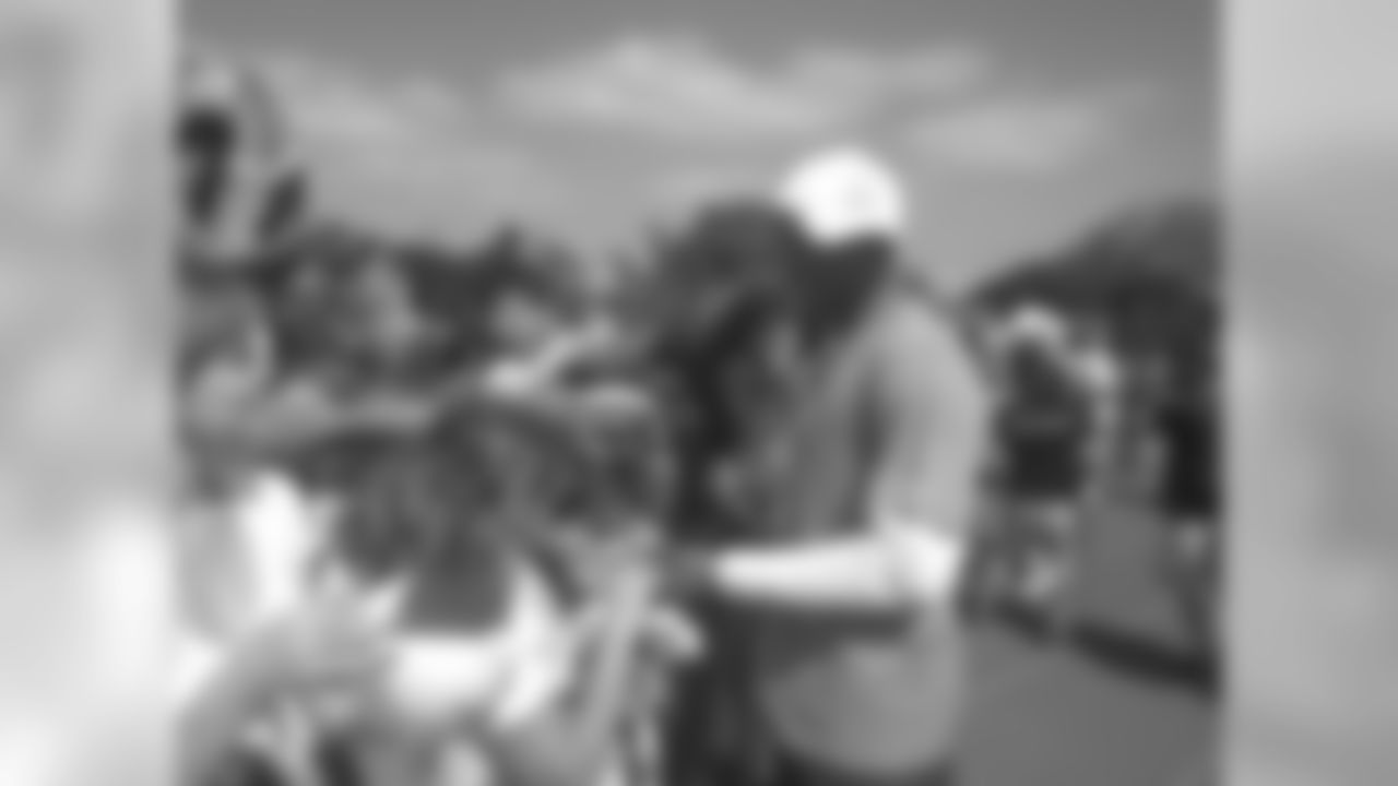 QB Cam Newton greets fans before Pro Bowl practice.
