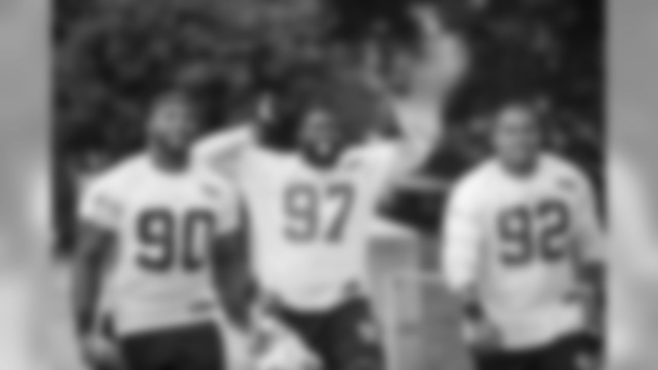 DE Frank Alexander, DE Mario Addison, and DT Dwan Edwards