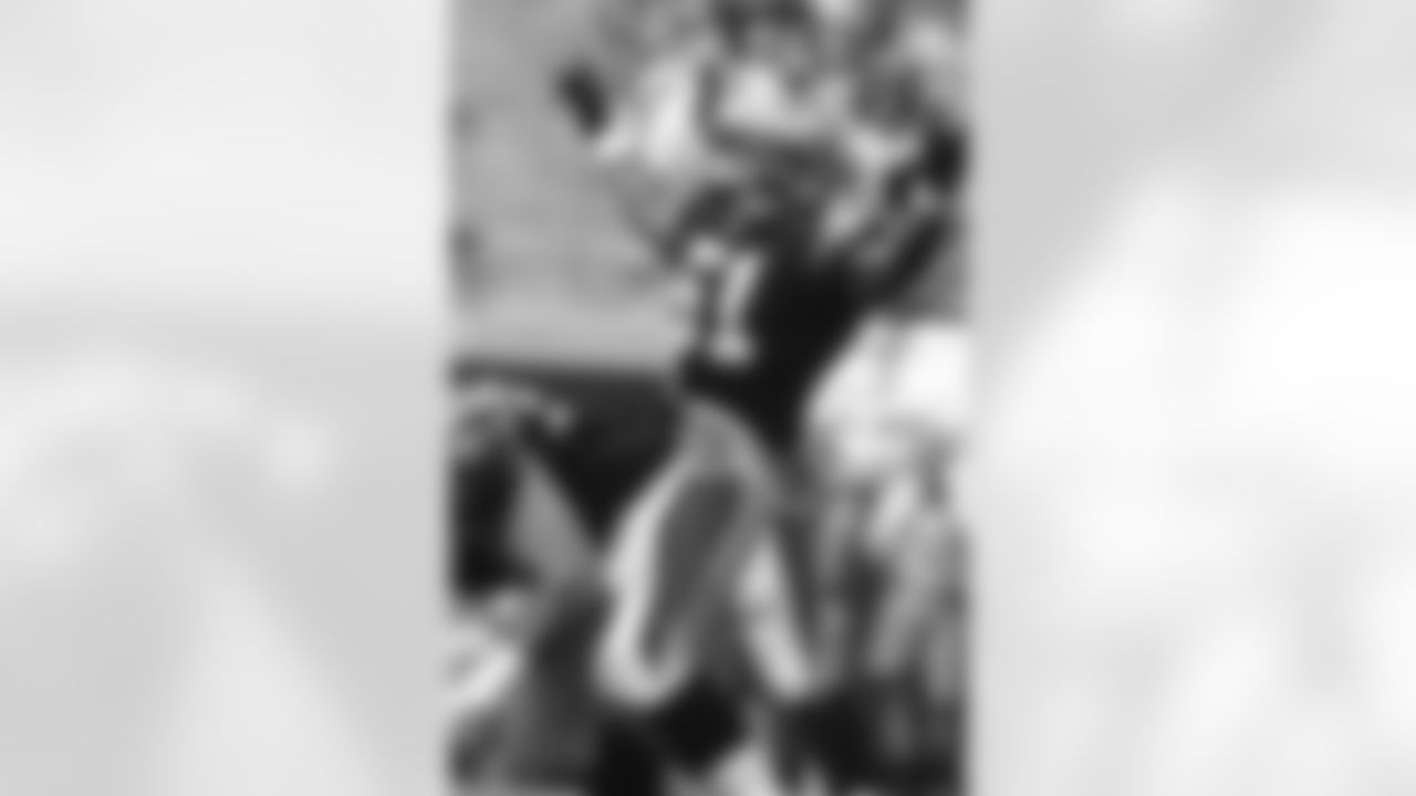 Sam Mills played for Carolina from 1995-97, then served as an assistant coach from 1998-2004.