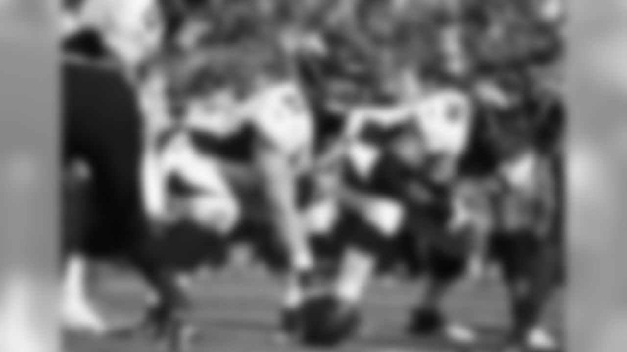 Denver Broncos center Matt Paradis (61) sets for play at the line of scrimmage against the Jacksonville Jaguars  Dec.4, 2016 during an NFL football game in Jacksonville, Fla. Denver won 20 - 10.  (Al Messerschmidt via AP)