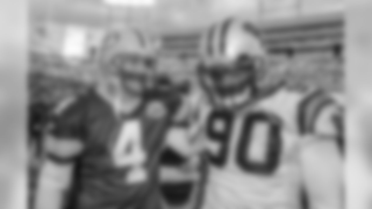 Julius Peppers and Brett Favre after a game against the Green Bay Packers at Lambeau Field on Sunday, November 18, 2007.