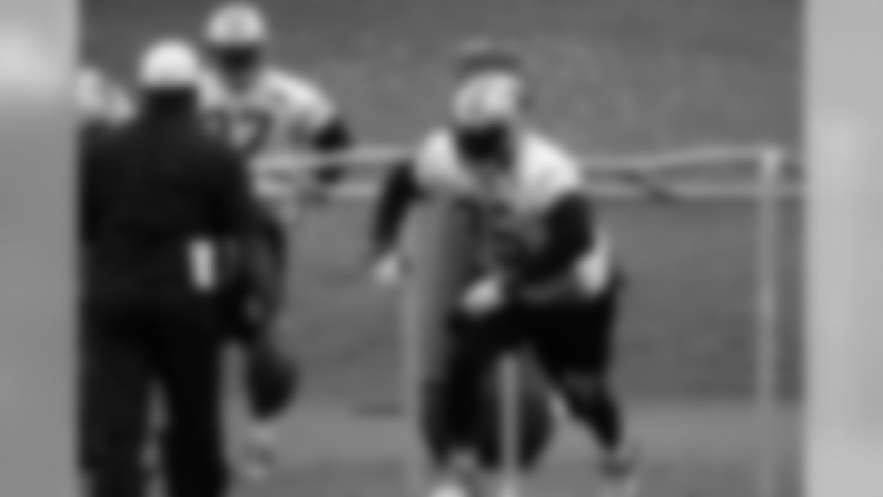 Defensive end Charles Johnson completes a drill.