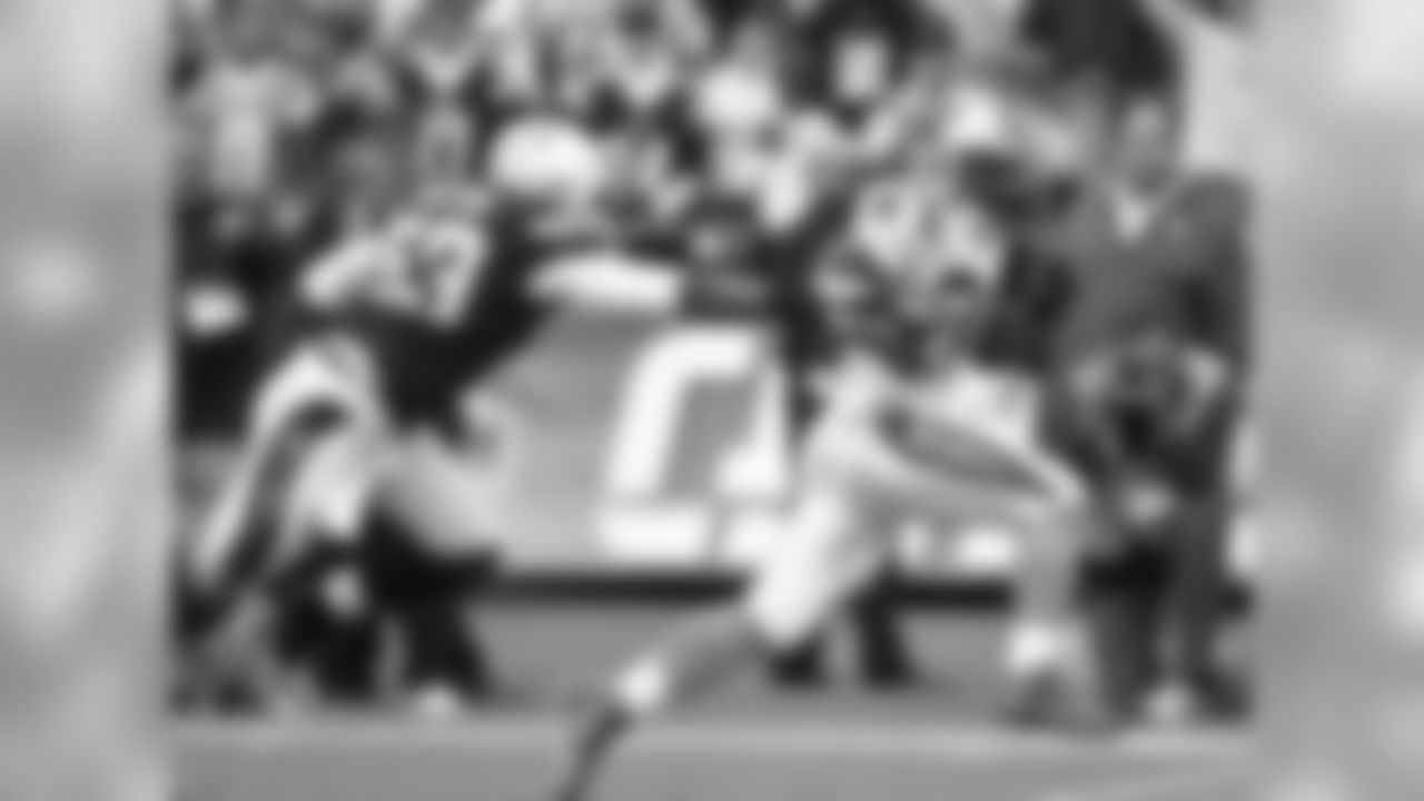 Williams hauls in a tipped pass and runs 45 yards for a touchdown in San Diego.