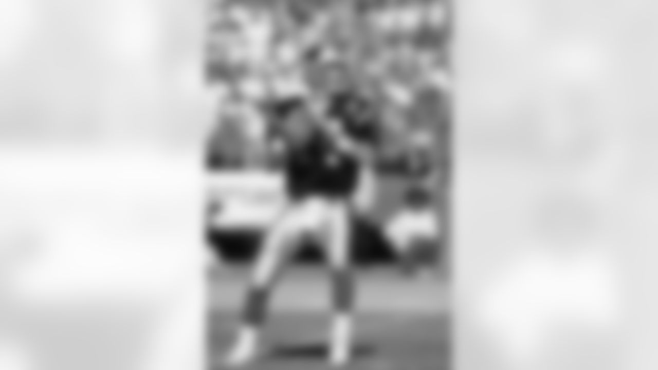 SAN FRANCISCO, CA - AUGUST 19: Quarterback Frank Reich #14 of the Carolina Panthers looks to pass during the exhibition game against the San Francisco 49ers at Candlestick Park on August 19, 1995 in San Francisco, California. The 49ers won 17-10. (Photo by George Rose/Getty Images)