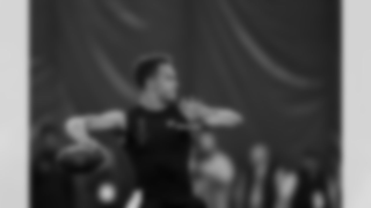 Quarterback Desmond Ridder throws a pass in a football drill during Cincinnati Pro Day in Cincinnati, Thursday, March 24, 2022. (AP Photo/Aaron Doster)