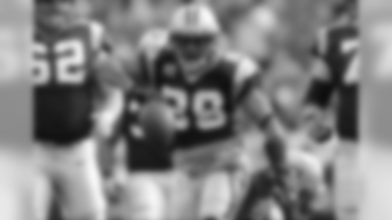 Smith spins the ball after picking up a first down against the Oakland Raiders.