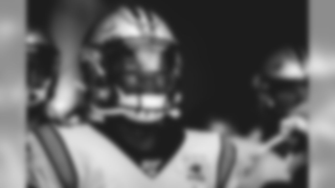 Some of my favorite moments to capture weren't always action. During the intros of the Week 4 game in Houston, I was able to capture this cool image of the opposing team's logo reflecting off of cornerback James Bradberry's visor. This image spoke to me as it represented his focus being on the task at hand.
