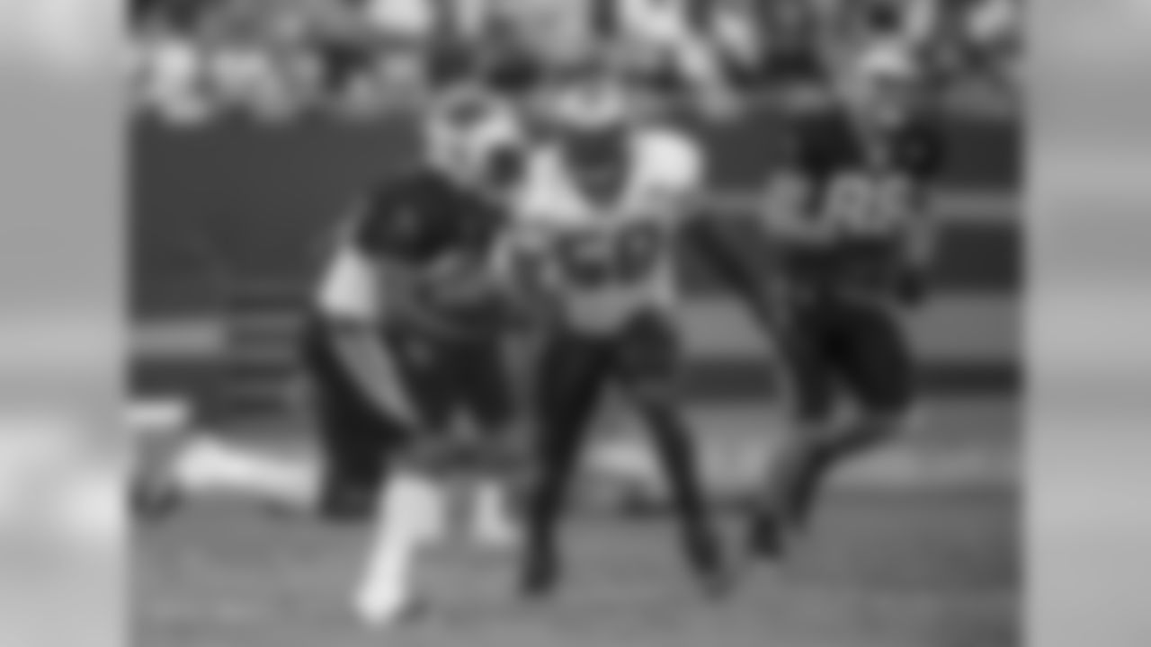 RB Fozzy Whittaker and LB Thomas Davis