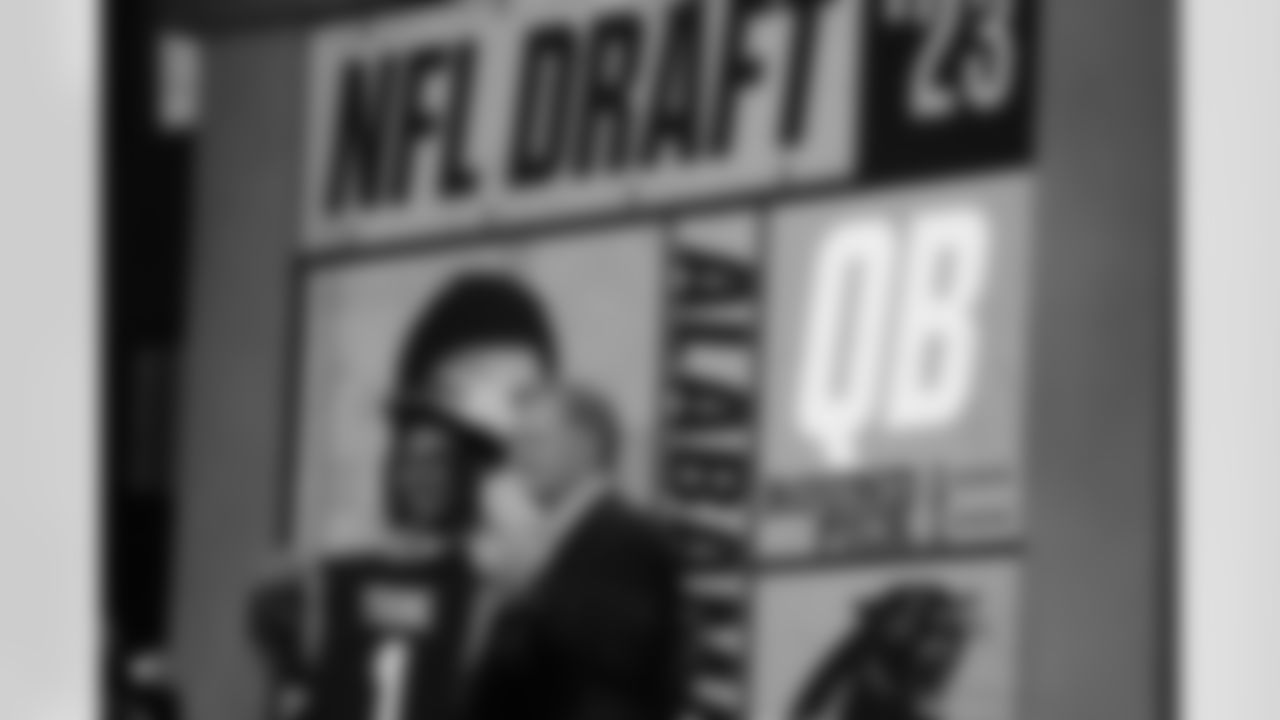 Alabama quarterback Bryce Young, left, stands with NFL Commissioner Roger Goodell after being chosen by the Carolina Panthers with the first overall pick during the first round of the NFL football draft, Thursday, April 27, 2023, in Kansas City, Mo. (AP Photo/Charlie Riedel)