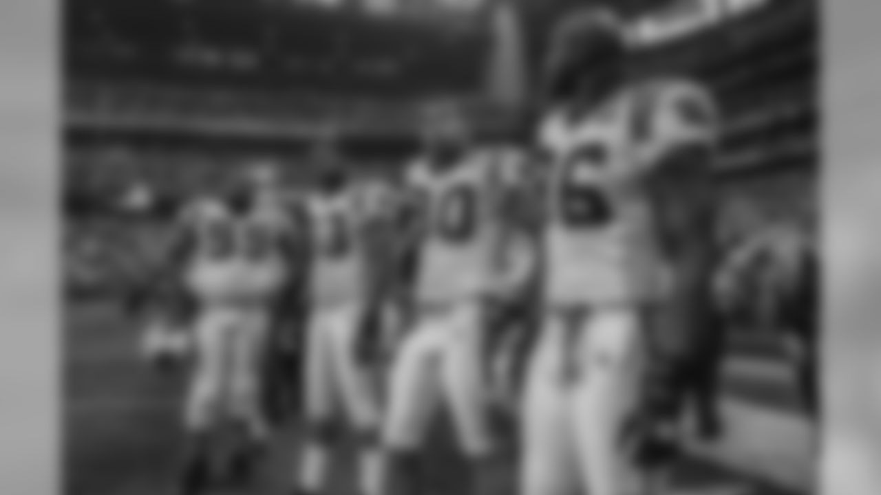 Julius Peppers alongside Brentson Buckner, Mike Rucker and Al Wallace at Super Bowl XXXVIII in 2004.