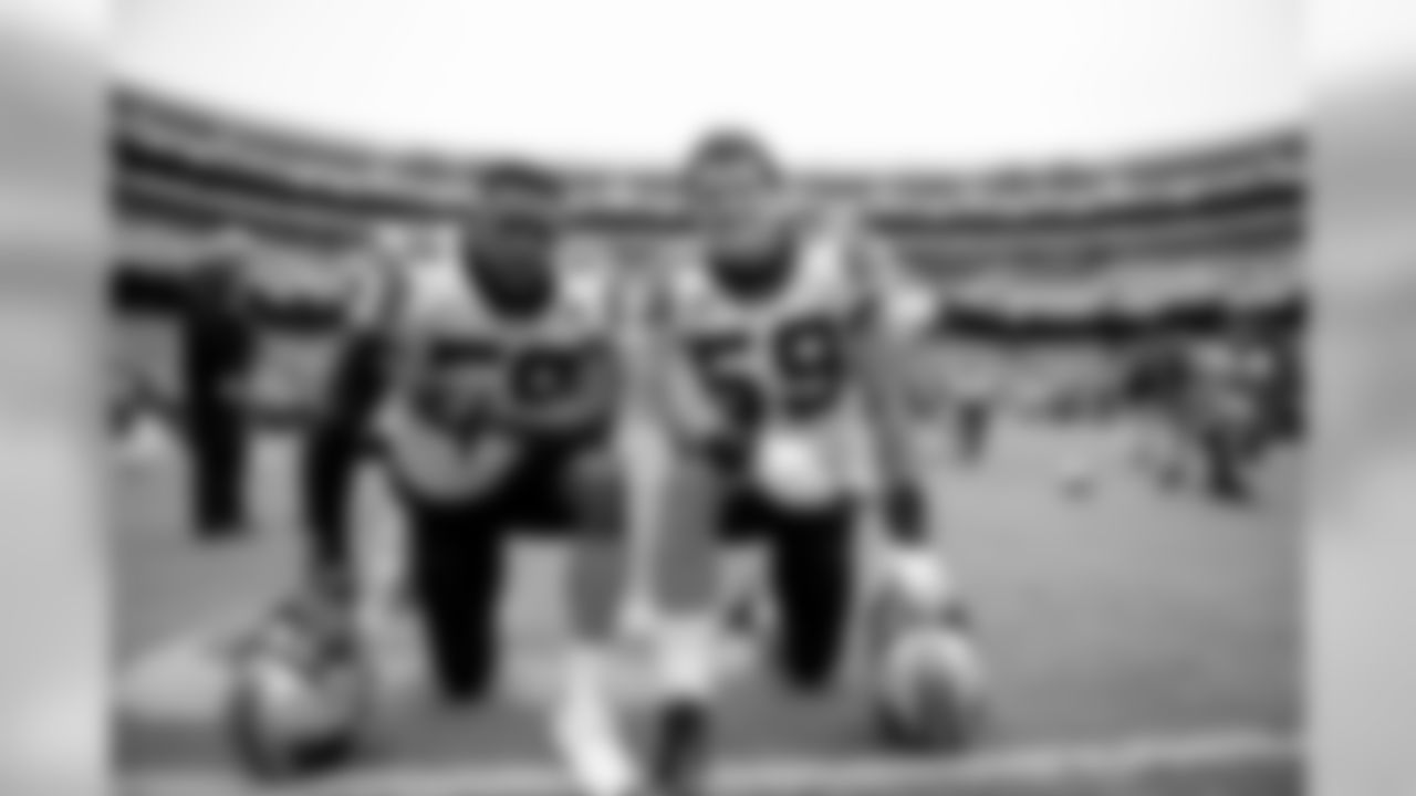 Thomas Davis and Luke Kuechly during team stretch before the game against Washington on Sunday, Oct. 14, 2018 at FedEx Field in Landover, MD.