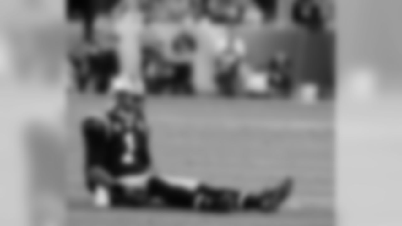 Carolina Panthersâ Cam Newton (1) sits on the field during the first half of the NFL Super Bowl 50 football game Sunday, Feb. 7, 2016, in Santa Clara, Calif. (AP Photo/Matt York)