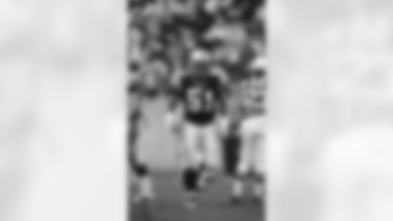 Sam Mills played for Carolina from 1995-97, then served as an assistant coach from 1998-2004.