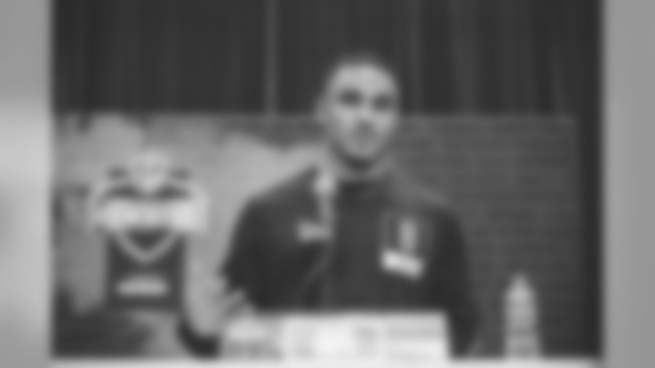Quarterback Jalen Hurts at the podium.