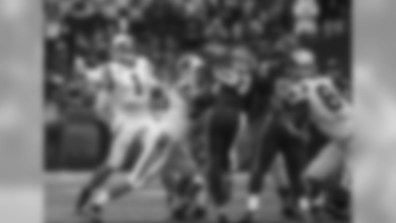 QB Cam Newton and T Mike Remmers