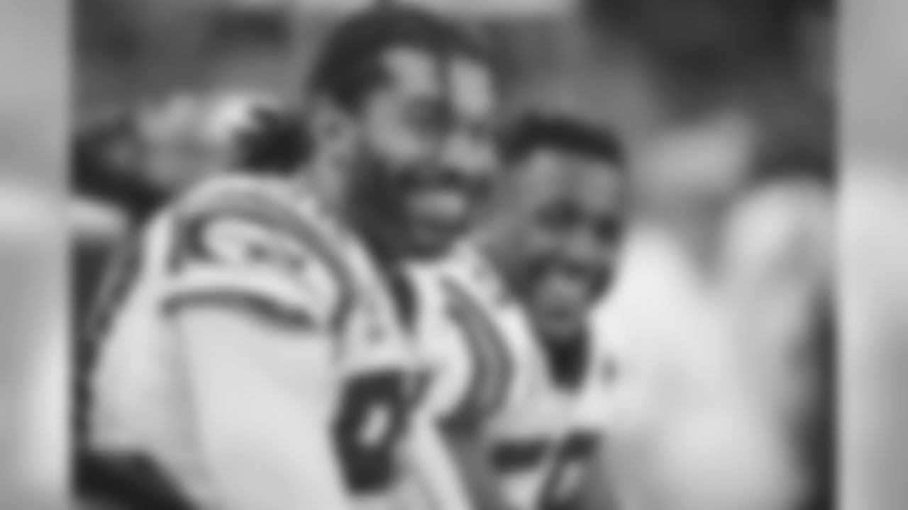 Thomas Davis and Julius Peppers talk on the sidelines against the New Orleans Saints at Mercedes-Benz Superdome on Sunday, December 30, 2018.