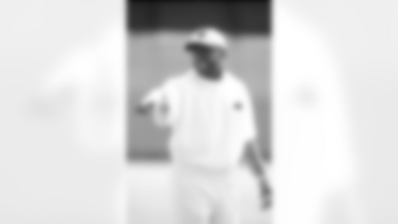 Sam Mills played for Carolina from 1995-97, then served as an assistant coach from 1998-2004.