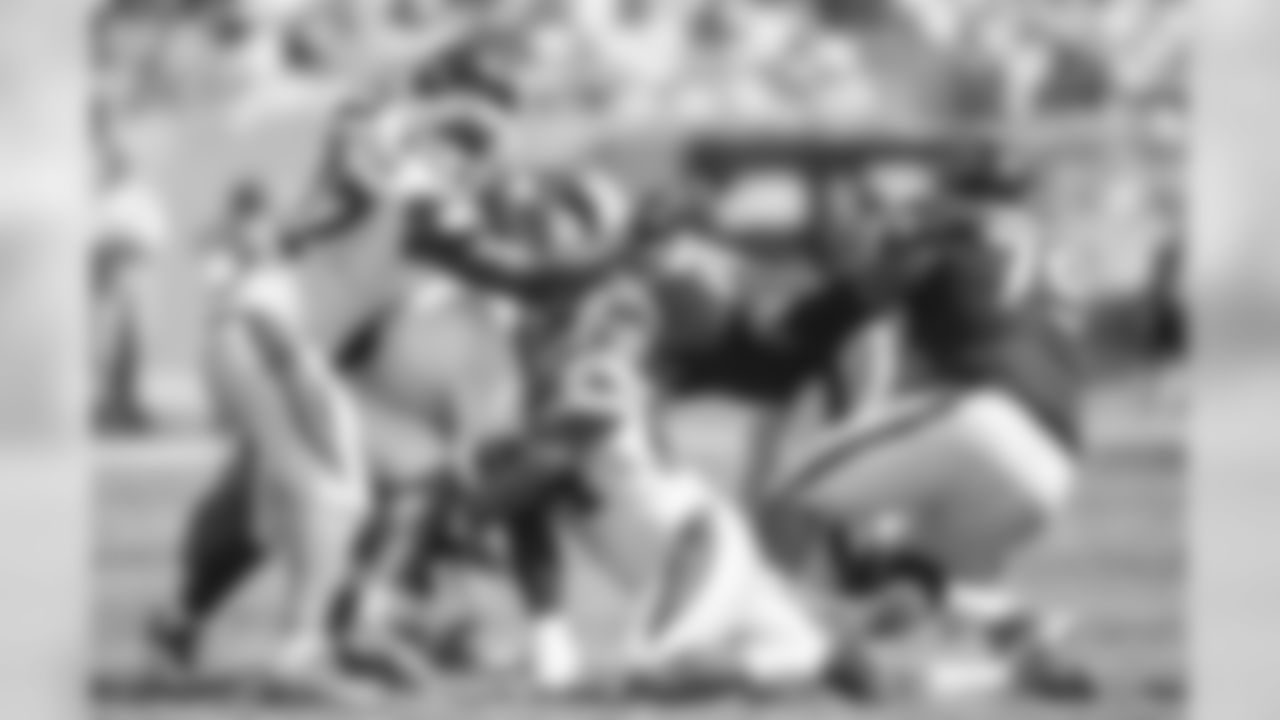 DE Mario Addison and LB Shaq Thompson