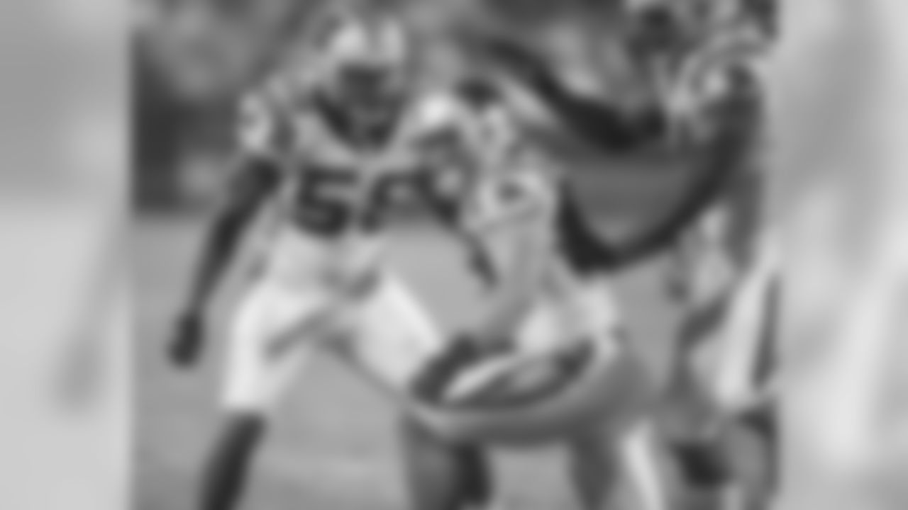 LB Thomas Davis, Sr., LB Luke Kuechly and DE Mario Addison