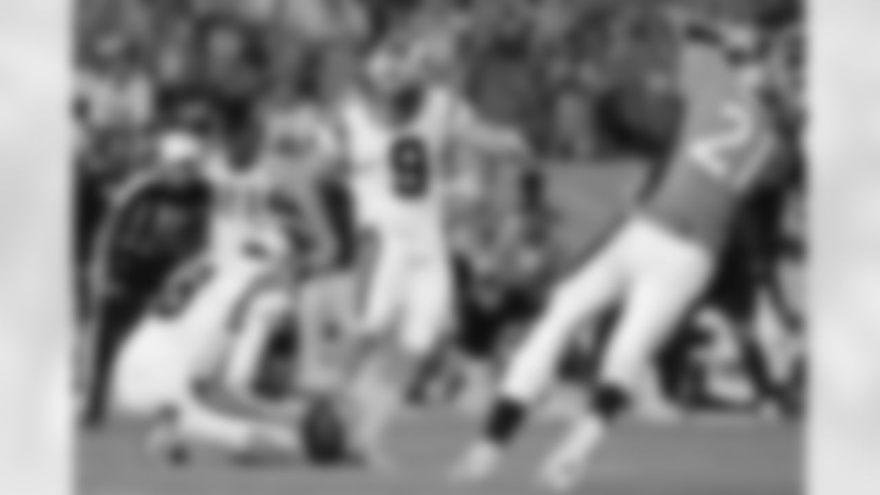 Carolina Panthers kicker Graham Gano (9) misses a field goal attempt as punter Andy Lee (8) holds during the second half of an NFL football game against the Denver Broncos, Thursday, Sept. 8, 2016, in Denver. The Broncos won 21-20. (AP Photo/Jack Dempsey)