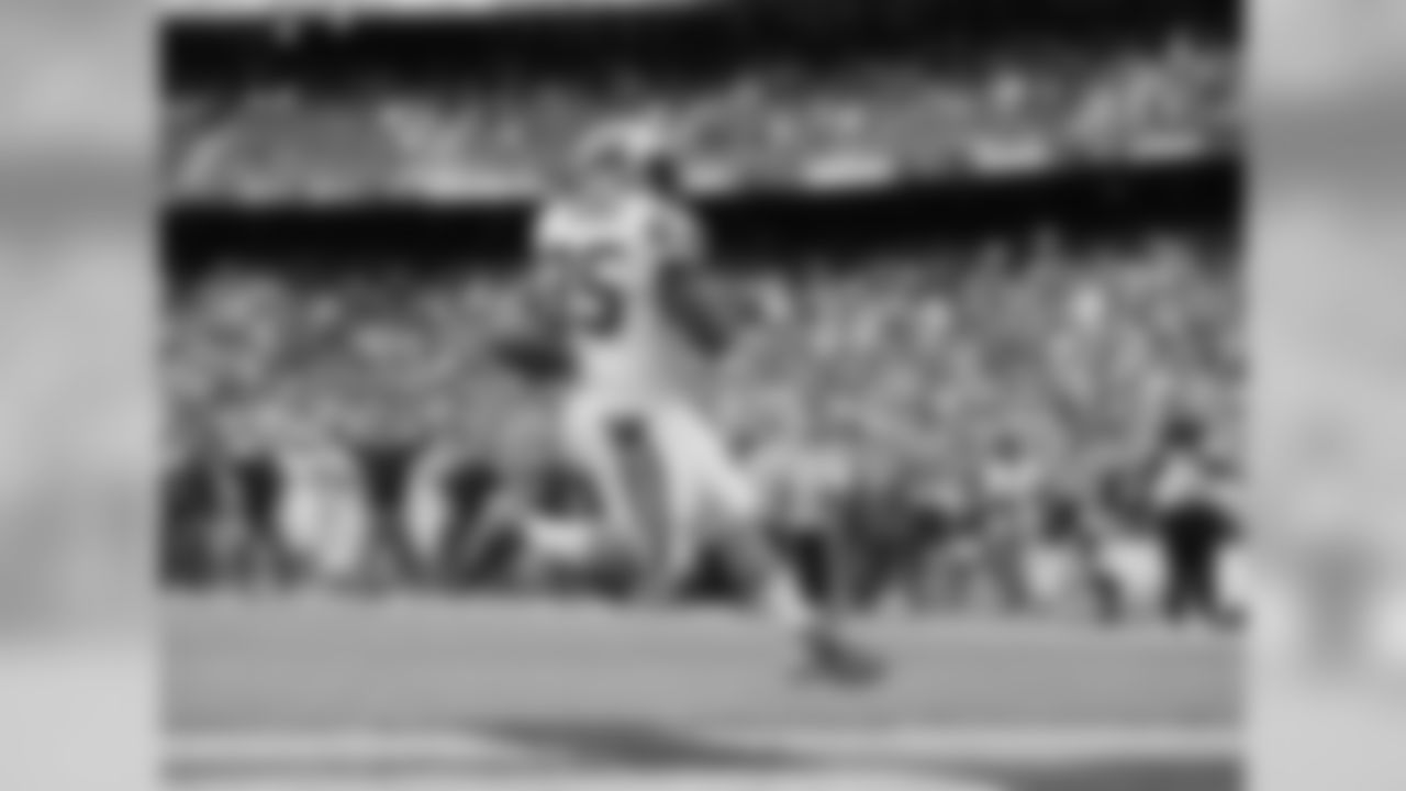 Carolina Panthers fullback Mike Tolbert sails into the end zone untouched while scoring his second touchdown against the San Diego Chargers during the first half of a NFL football game Sunday, Dec. 16, 2012, in San Diego. (AP Photo/Gregory Bull)