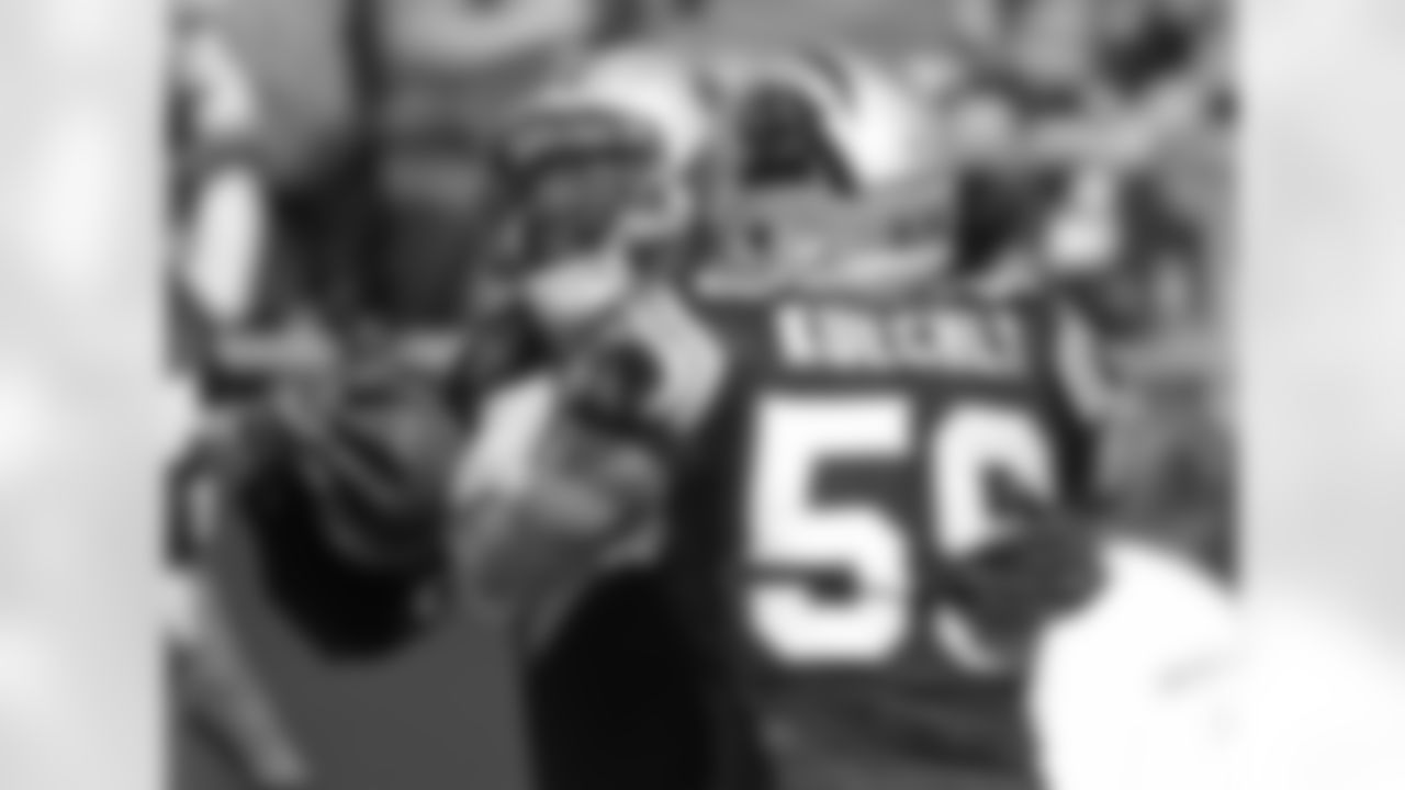 Luke Kuechly and Thomas Davis