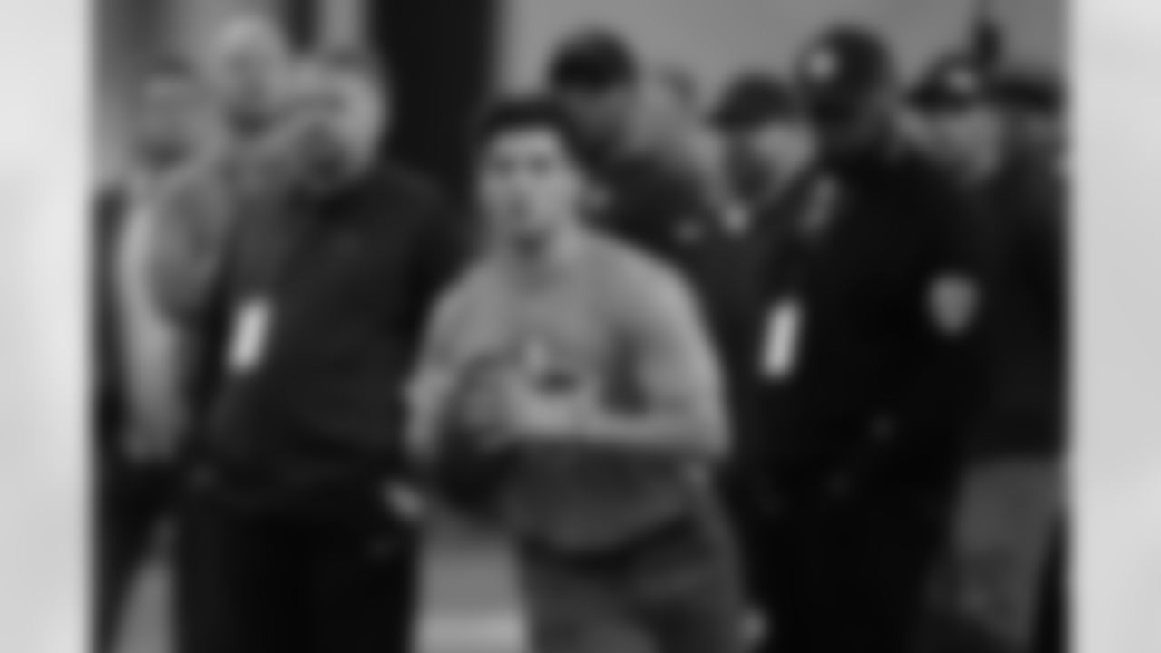 Quarterback Matt Corral sets up to pass during a football drill at the Mississippi Pro Day in Oxford, Miss., Wednesday, March 23, 2022. (AP Photo/Rogelio V. Solis)